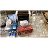 Image 1 : Table lot of misc. - includes bottle water dispensing system / water filters / motor / plastic inser