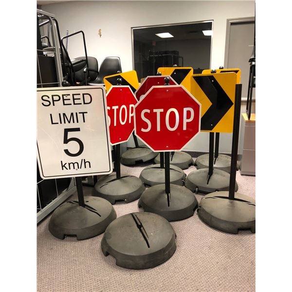 Group of 8 signs w/ wheel bases includes stop sign / arrow sign / speed ...