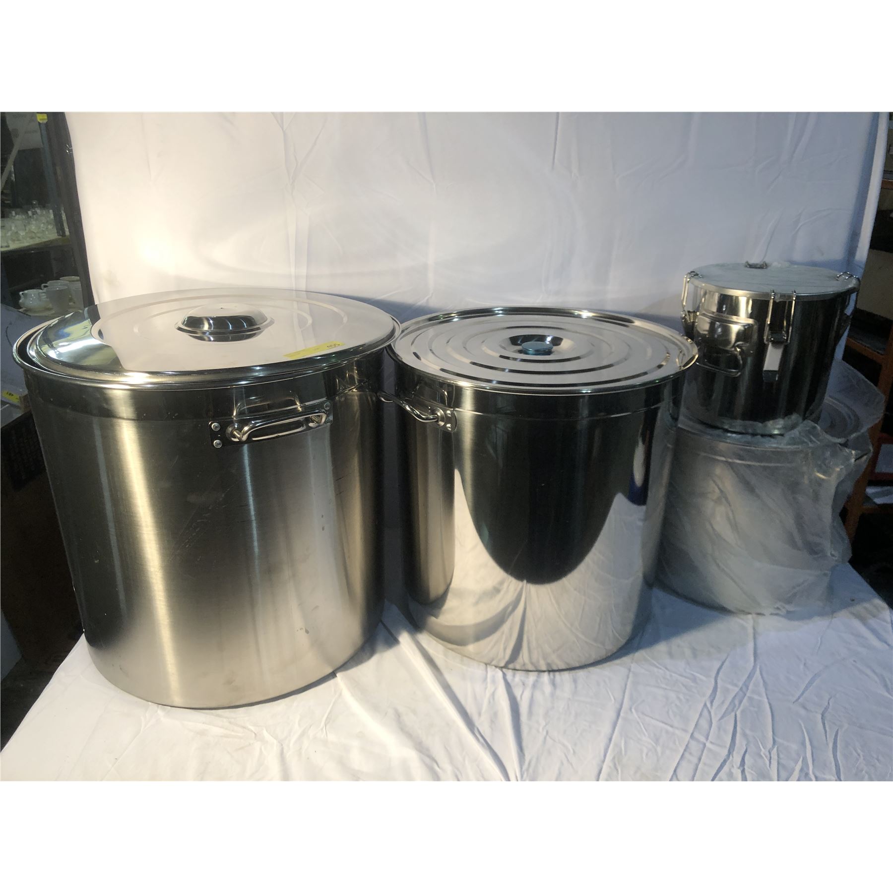 Group of 3 assorted sizes stainless steel kitchen containers
