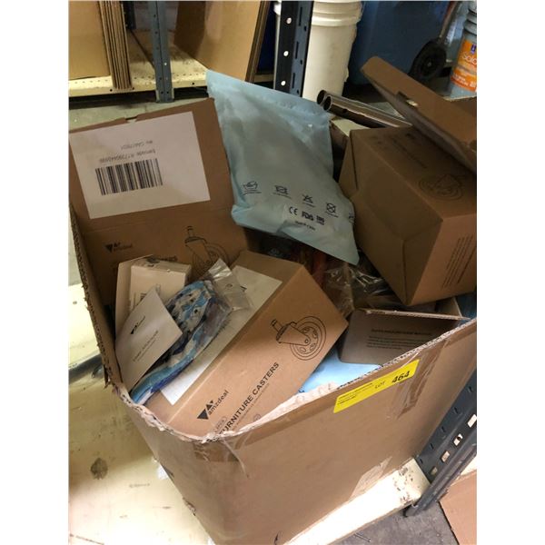 A box full of assorted items - includes furniture casters/MDK fingertip pulse oximeter/seamless wear