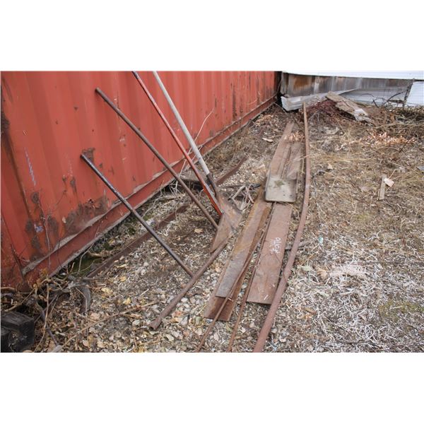 Misc. steel & tools, east side of seacan