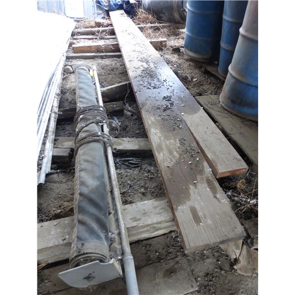 Roll tarp (for 1 ton) & 2- planks