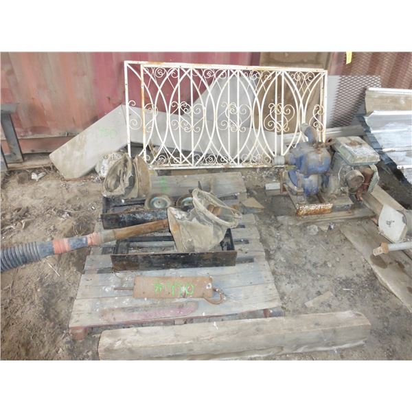White railing, metal, wheels, expanded metal, old water pump