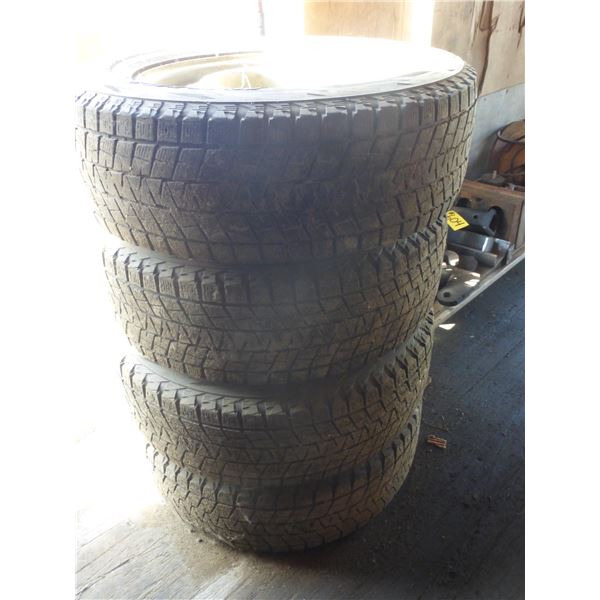 4- 5 hole rims & 4- 245/65 R17s tires