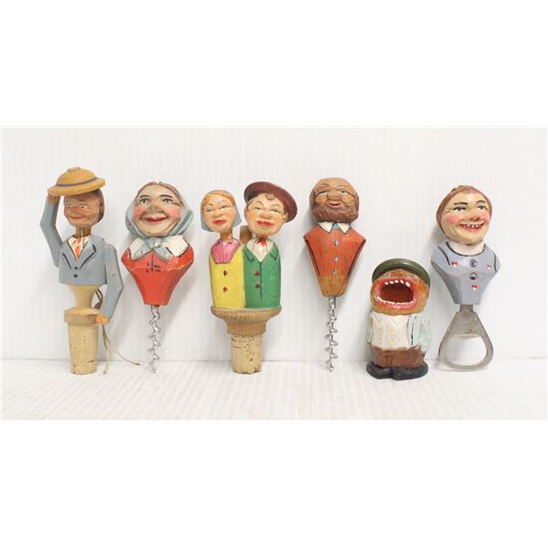 LOT OF CARVED WOOD CORK SCREWS AND BOTTLE TOPS