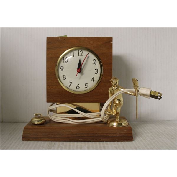 VINTAGE ELECTRIC CURLING TROPHY CLOCK