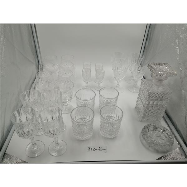 Assortment of Crystalware Includes Decanter, Stemware, Tumbler, and