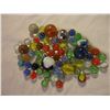 Image 2 : Lot of marbles, Pez, toys, cards, clock as pictured