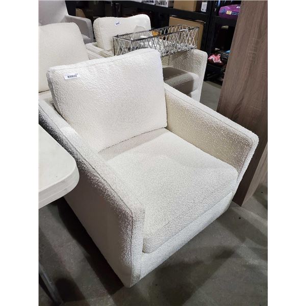 White Upholstered Armchair with Swivel Base