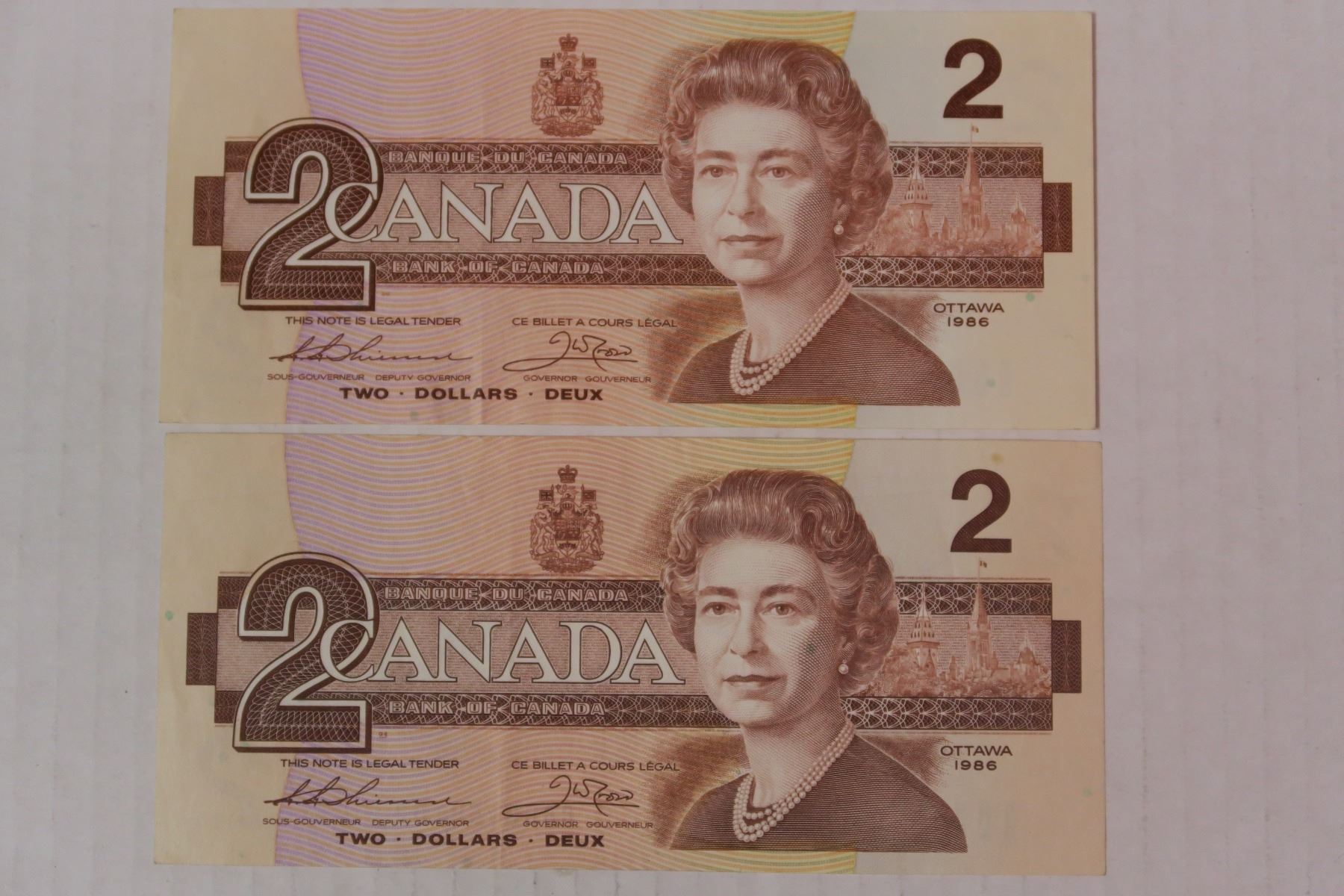 set Of 2 1986 Canada 2 Dollar Bill Schmalz Auctions set-of-2-1986-canada-2-dollar-bill-schmalz-auctions