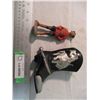 Image 1 : Boot bank, RCMP figure (damaged)