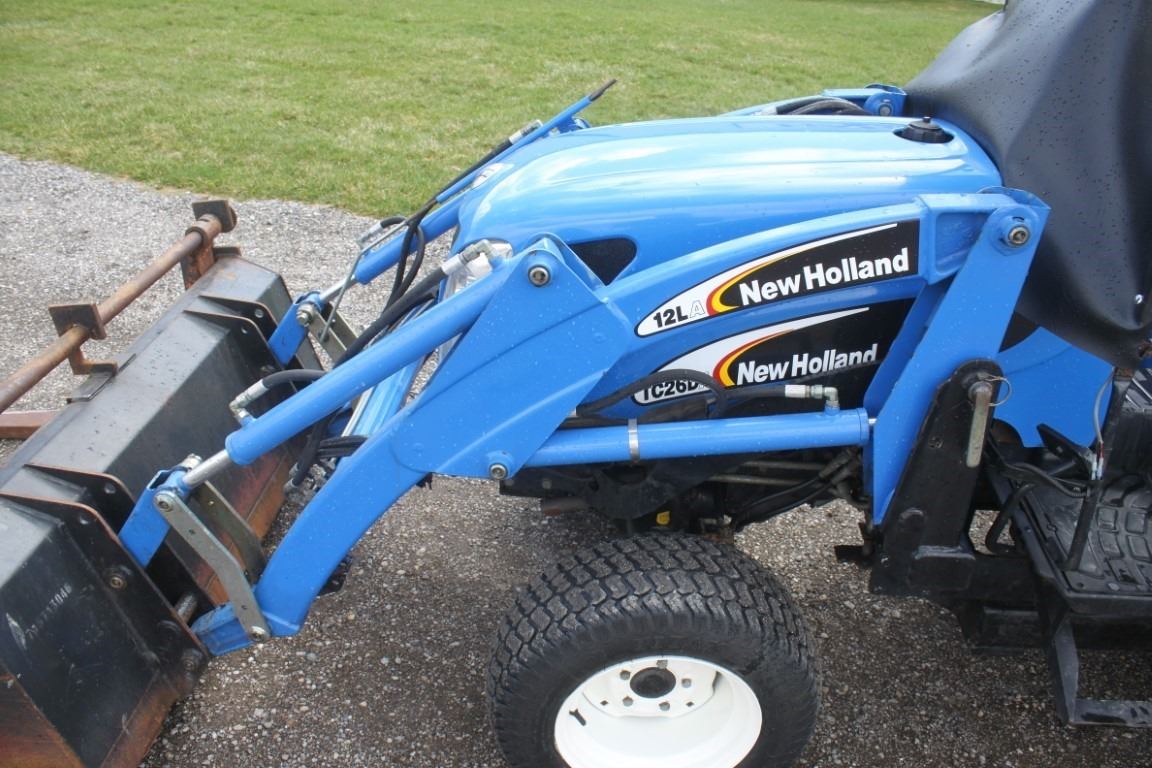 New Holland TC26DA 4wd compact tractor, NH 12LA loader, NH 756C backhoe