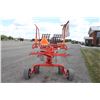 Image 6 : Kuhn 4121GTH Masterdrive hydraulic lift rotary rake, walking tandem axles, very good