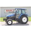 Image 1 : New Holland TL80 2wd tractor, cab, air, 24 speed power shuttle, 18.4x30, 2 remotes, 4 front weights,