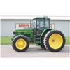 Image 1 : JD 7210 4wd tractor, cab, air, 420/80R46 axle duals, 20 speed power quad w/ creeper & left hand reve