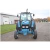 Image 3 : Ford 7740 SLE 2wd tractor, cab, air, 18.4x34,  2 remotes, 18.4x34, 6 front weights, 5162 hours, one