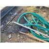 Image 2 : leaf rake + garden hose + weeder + window wash brush