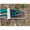 Image 4 : leaf rake + garden hose + weeder + window wash brush