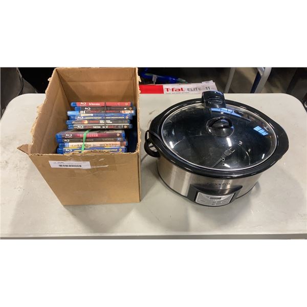 BOX OF BLU RAY DVDS AND CROCKPOT