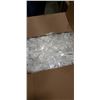 Image 4 : COOLER OF NEW BODY CREAMS LOTIONS AND BOX OF PLASTIC FORKS