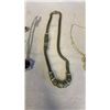 Image 4 : 4 NECKLACES, 2 PINS, AND ONE PAIR CLIP ON EARRINGS