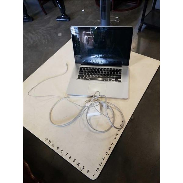 MACBOOK PRO LAPTOP 250GB SEAGATE HDD, INTEL CORE II DUO, 4GB RAM WITH AC CHARGER