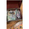 Image 5 : HANDCRAFTED STONE CHESS BOARD AND LEATHER CASE FULL OF SPORTS CARDS