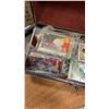Image 6 : HANDCRAFTED STONE CHESS BOARD AND LEATHER CASE FULL OF SPORTS CARDS
