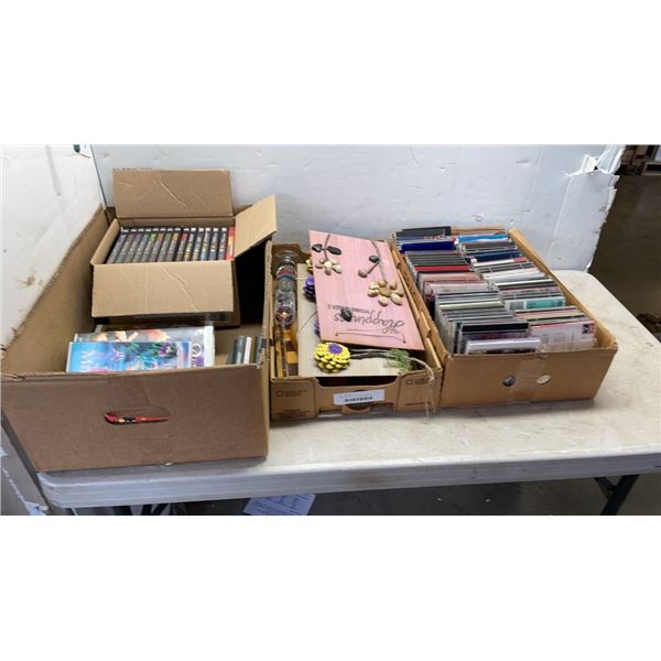 2 BOXES OF CDS, MOVIES AND HOMES DECOR