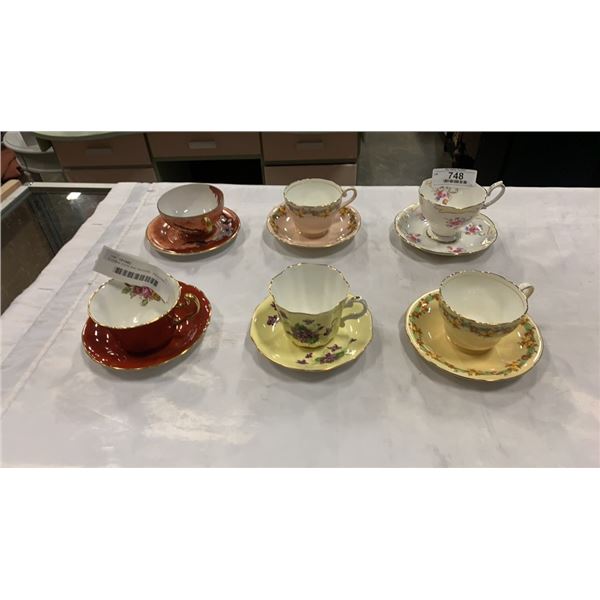 6 CHINA CUPS AND SAUCERS - INCLUDING 2 AYNSLEY, ADDERLEY, ROYAL ALBERT, CONSORT AND ELLIE