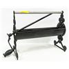 Image 1 : VINTAGE CAST IRON PAPER LOG ROLLER