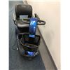 Image 1 : Pride - motorized scooter w/ battery charger ((working condition)