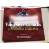 Image 2 : Large group of Vancouver Canucks memorabilia - includes 2002-2003 medallion collection / books / mag