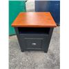 Image 1 : Filing cabinet black with wood top approximately 22" tall 18" wide 15 1/4" deep