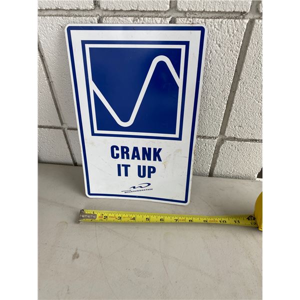Crank it up tin sign
