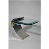 Image 1 : A Chrome and Glass Side Table in the Style of Karl Springer.