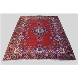 A Persian Heriz Rug.