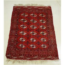 A Bokhara Wool Rug.