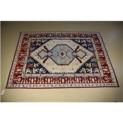 A Persian Wool Rug.