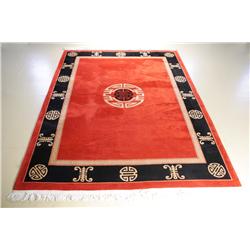 A Contemporary Red Wool Rug with Asian Motif,