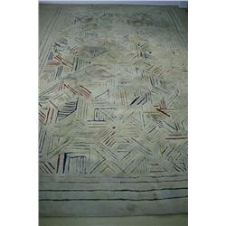 An Edward Fields Rug, with Colored Geometric Design on Ivory Field.