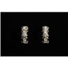 Image 1 : A Pair of 14kt. Yellow and White Gold and Diamond X-Form Earrings,