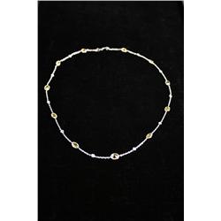 A 14kt. White Gold Yellow Sapphire and Diamond Necklace,