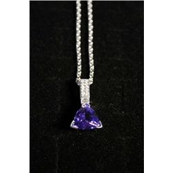 A 14kt. White Gold Tanzanite and Diamond Pendant and Chain,