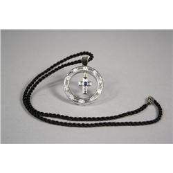 A 14kt. White Gold Sapphire and Diamond Cross Pendant with Black Woven Wool Necklace.