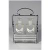 Image 1 : A Chrome and Glass Tantalus Set.