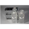 Image 4 : A Chrome and Glass Tantalus Set.
