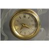 Image 2 : A Glass and Brass Clock.