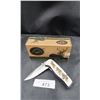 Image 1 : NEW OUTDOOR EDGE FOLDING POCKET KNIFE WITH WOLF DETAIL
