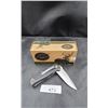 Image 2 : NEW OUTDOOR EDGE FOLDING POCKET KNIFE WITH WOLF DETAIL